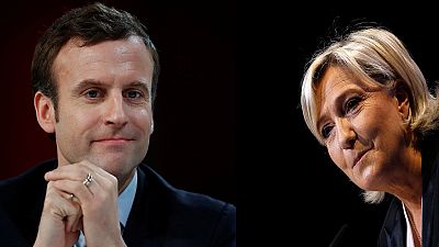 Le Pen lashes out at rivals as Macron tops latest polls