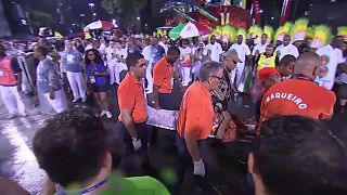 Rio carnival crash: at least a dozen people injured after float hits barrier