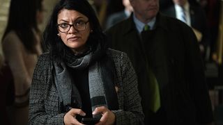 Image: Rep. Rashia Tlaib leaves a caucus meeting at the Capitol on Jan. 9, 