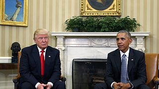 Trump accuses Obama of leaks and orchestrating protests