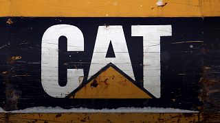 Caterpillar raided in tax probe