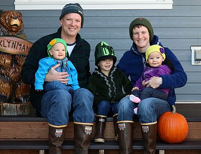Greg and Lizzy Klynman with their three children. Greg is a retired Coast Guard officer who served for 23 years and is at risk for losing his pension pay next month. Lizzy is an active-duty helicopter pilot with the Coast Guard who is working without pay as the shutdown continues.