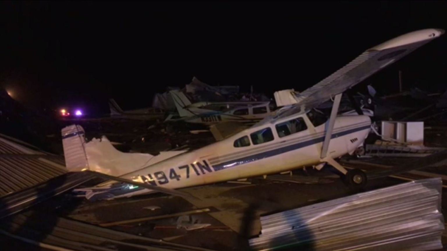 Plane flipped over after storm hits airport