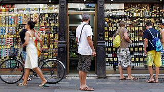Spanish retail sales slip as inflation rises