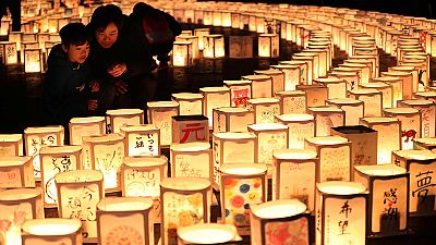 Japonya deprem ve tsunami felaketinin kurbanlarını andı