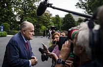 Rudy Giuliani speaks with reporters during on the South Lawn of the White H