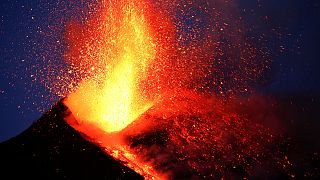 Mount Etna explodes showering BBC crew with rocks and magma
