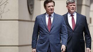 Paul Manafort and his lawyer, Kevin Downing, after a motion hearing at the 