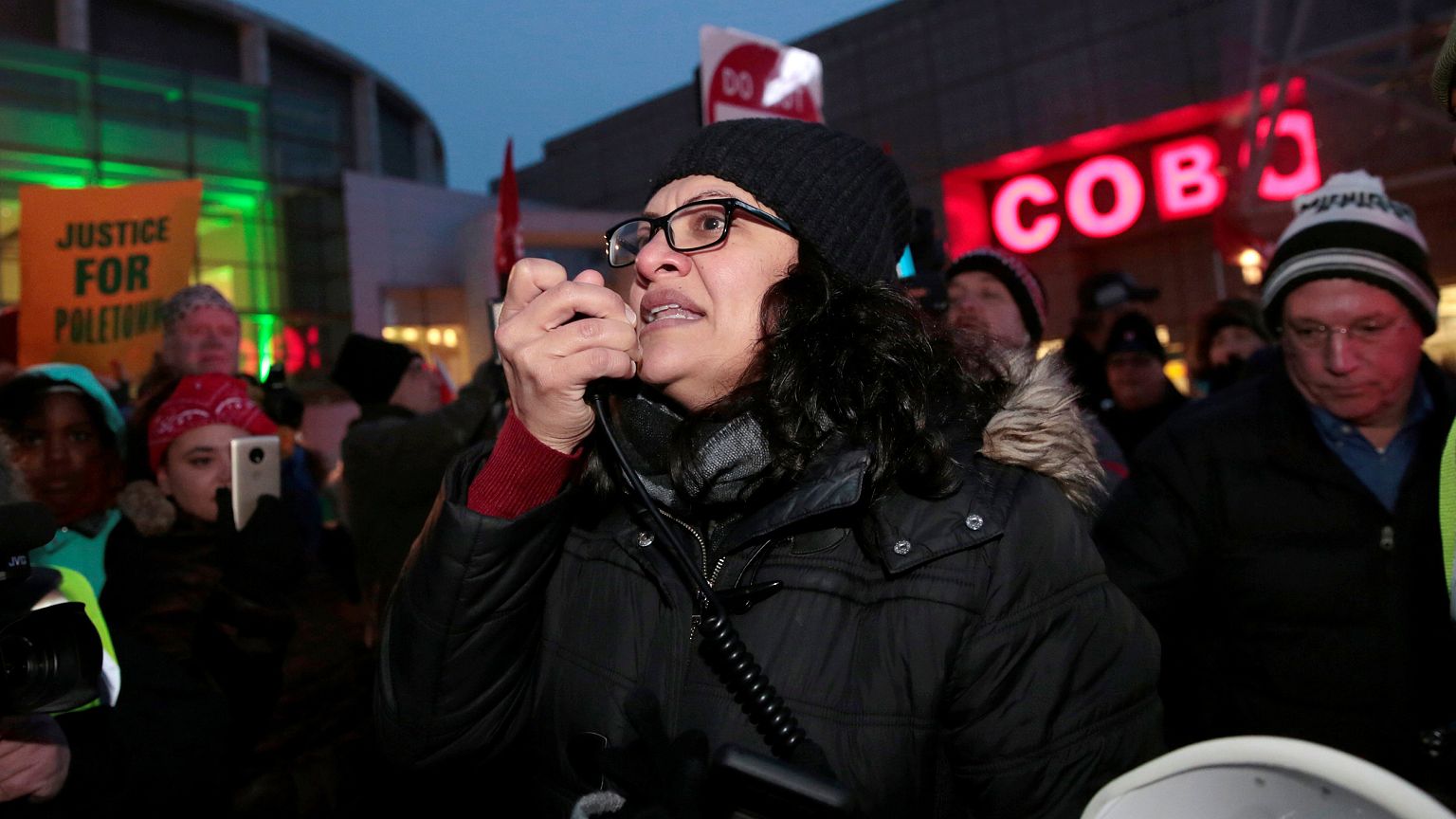 Image: Democratic Congresswoman Tlaib addresses a rally to protest General 