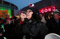 Image: Democratic Congresswoman Tlaib addresses a rally to protest General 