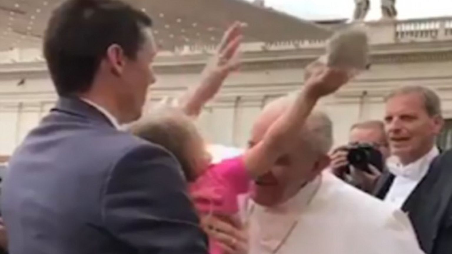 Watch: Cheeky little girl snatches Pope's skullcap
