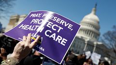 Trump scrambles for votes to bin Obamacare