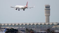 Image: An airplane and air traffic control tower on the 22nd day of the par