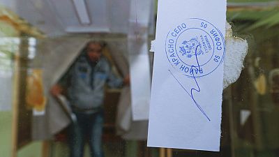 Bulgarians vote in close parliamentary poll