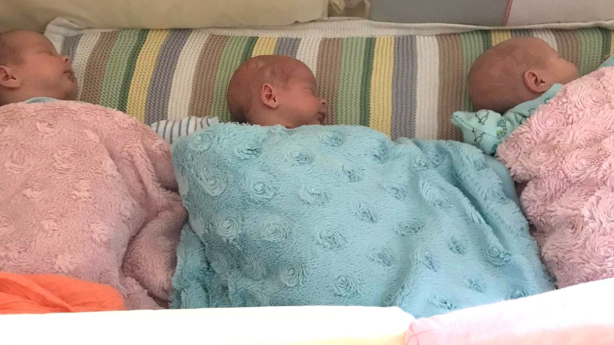 Woman who conceived twins naturally and a baby with IVF at the same time