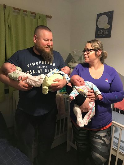 Beata and Powell Bienias are getting used to life with triplets after they conceived twins naturally and one baby with IVF.