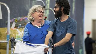 Image: Laurie Cooper and Hassan Al Kontar after he arrived in Vancouver