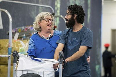Laurie Cooper greets Hassan Al Kontar after the Syrian refugee from Kuala Lumpur to Vancouver on Nov. 26.