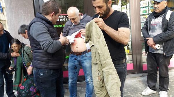 Cuatro heridos en Bruselas tras el choque entre opositores y partidarios a la consulta de Erdogan Cuatro heridos en Bruselas tras el choque entre opositores y partidarios a la consulta de Erdogan