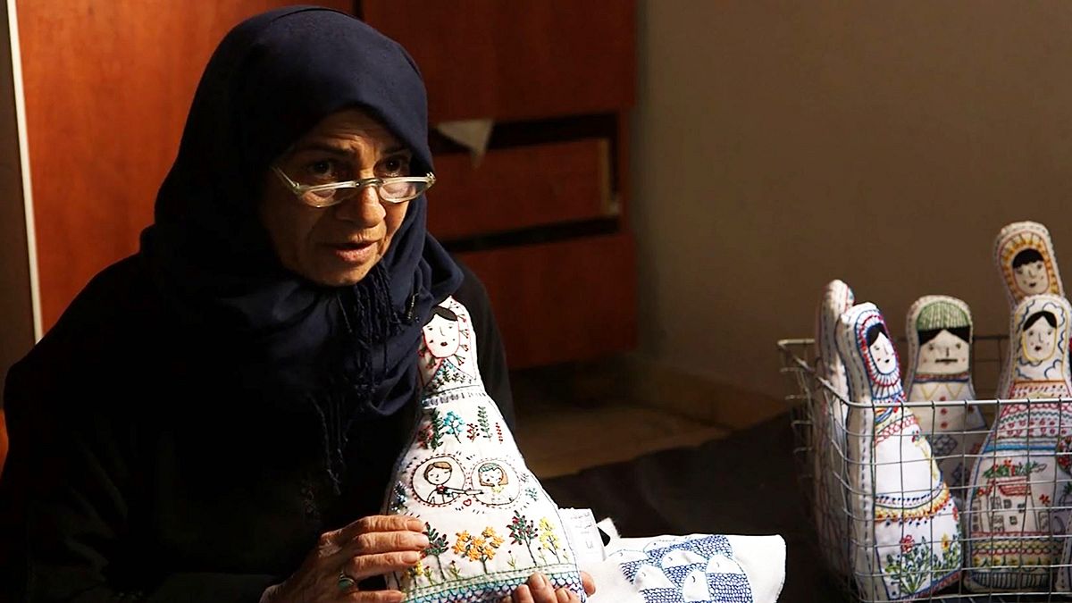 Embroidered dolls tell the stories of mothers in war-torn Aleppo