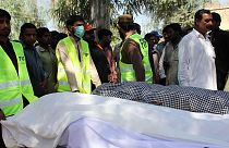 Murders at Pakistani shrine leave at least 20 dead