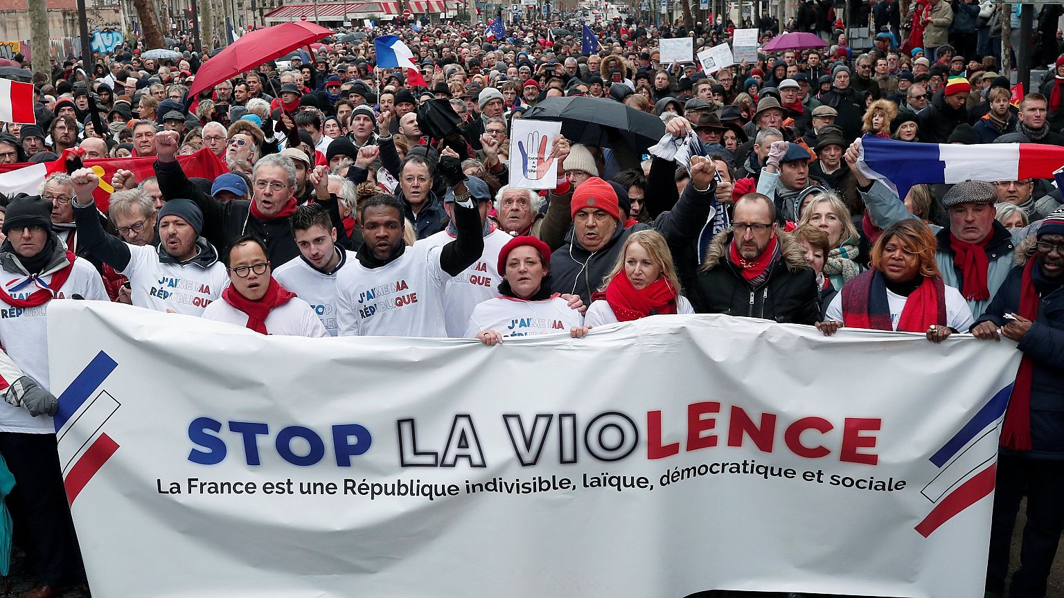 Image: Opponents to the "yellow vests" violent behaviour, take part in a de