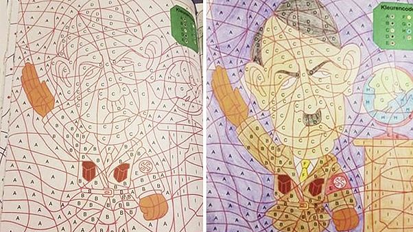 هولندا:سحب كتب تلوين للأطفال فيها رسم لهتر هولندا:سحب كتب تلوين للأطفال فيها رسم لهتر