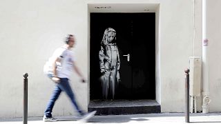 Image: FILES-FRANCE-STREET-ART-BANKSY