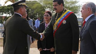 Venezuelan President Maduro pelted by angry crowd at rally