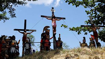 Filipino Catholics crucify themselves in a biblical reenactment