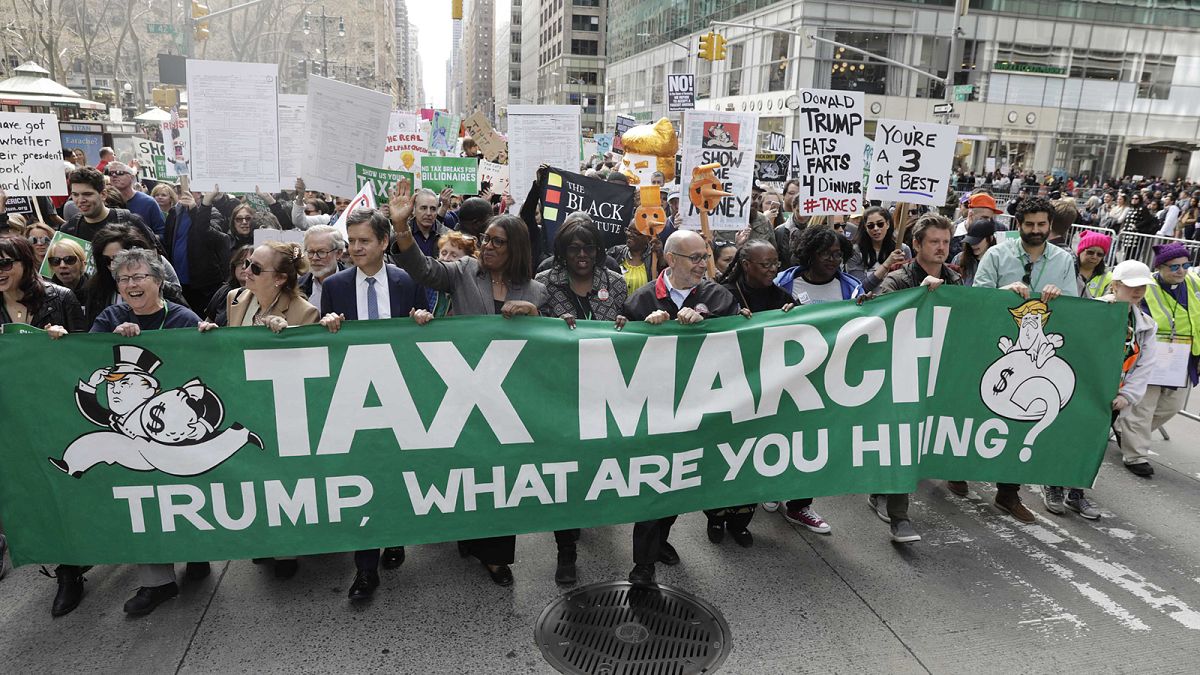 Trump urged to show his tax returns by protesters US-wide