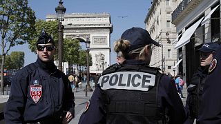 French police detain family members of Champs Elysees shooter