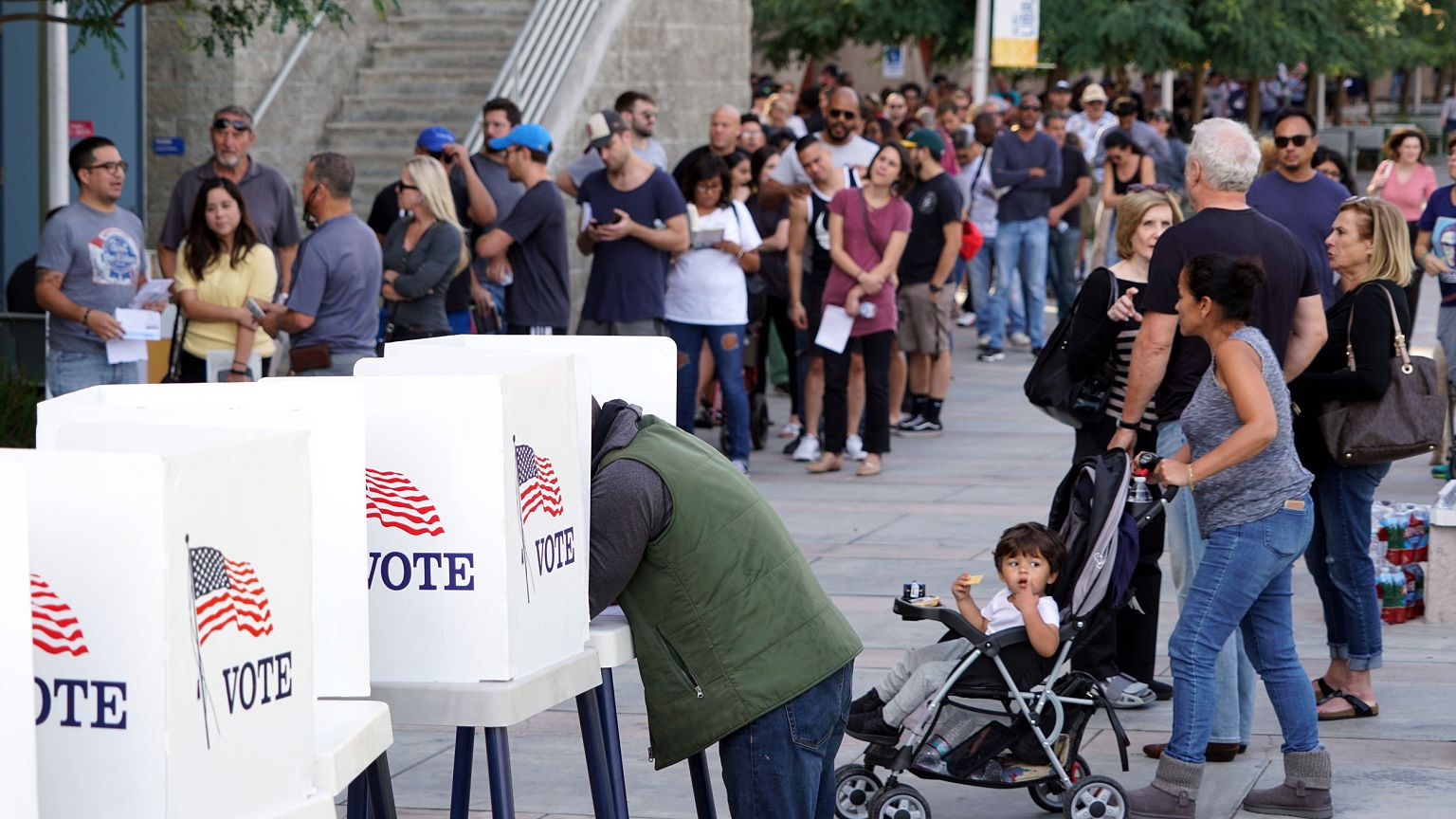 A voter marks his ballot at an early voting polling station at West Los Ang