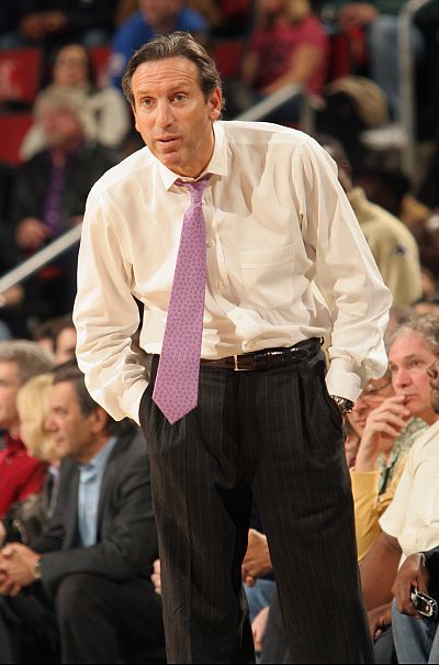 Howard Schultz, Chairman of the Seattle Basketball Club, which owns the Seattle Sonics, watches the game against the Toronto Raptors at Key Arena in Seattle, Washington on November 12, 2004.
