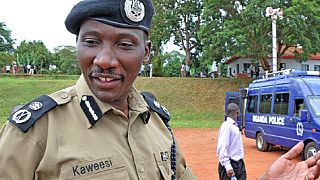Thirteen charged in Uganda over murder of top policeman