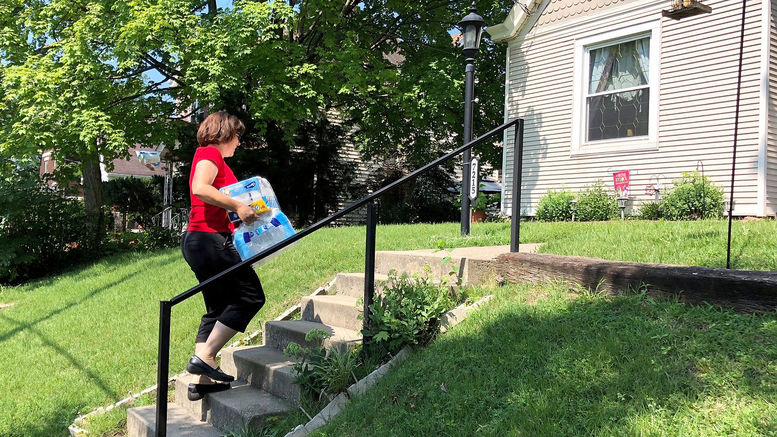 Cincinnati DoorDash worker Renee Shell delivers an order from Walmart in Ci