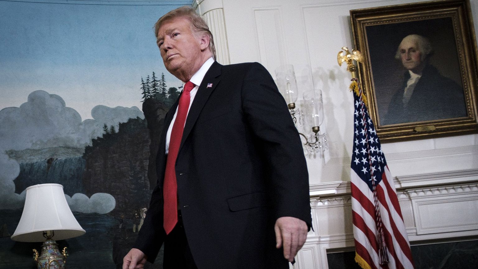 Image: President Donald Trump exits the Diplomatic Reception Room at the Wh