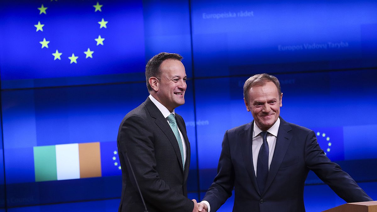 Image: Irish Prime Minister Leo Varadkar, left, shakes hands with European 