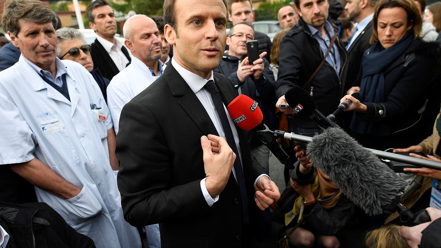 Russia cries "discrimination" as France's Macron bans RT and Sputnik from campaign