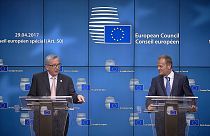 EU leaders approve tough terms for Brexit talks