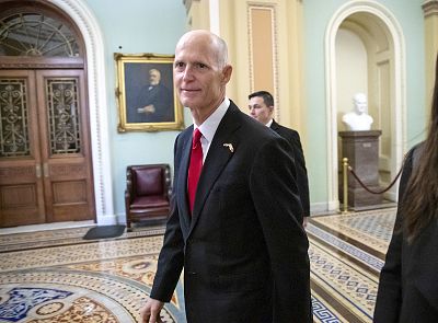 Florida Sen. Rick Scott arrives for a meeting with Majority Leader Mitch McConnell, R-Ky., and new GOP senators at the Capitol in Washington on Nov. 14, 2018.