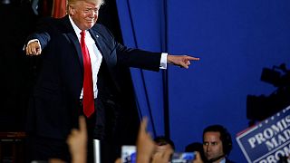 Trump attacks US media at 100-day rally