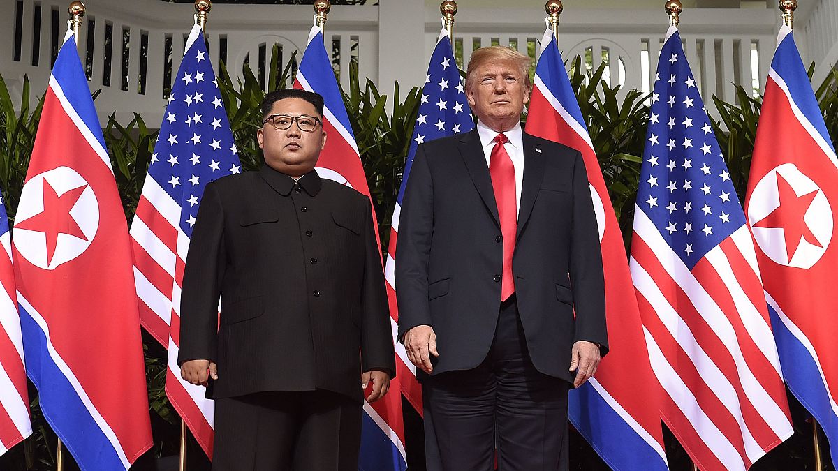 Image: President Donald Trump poses with North Korea's leader Kim Jong Un a