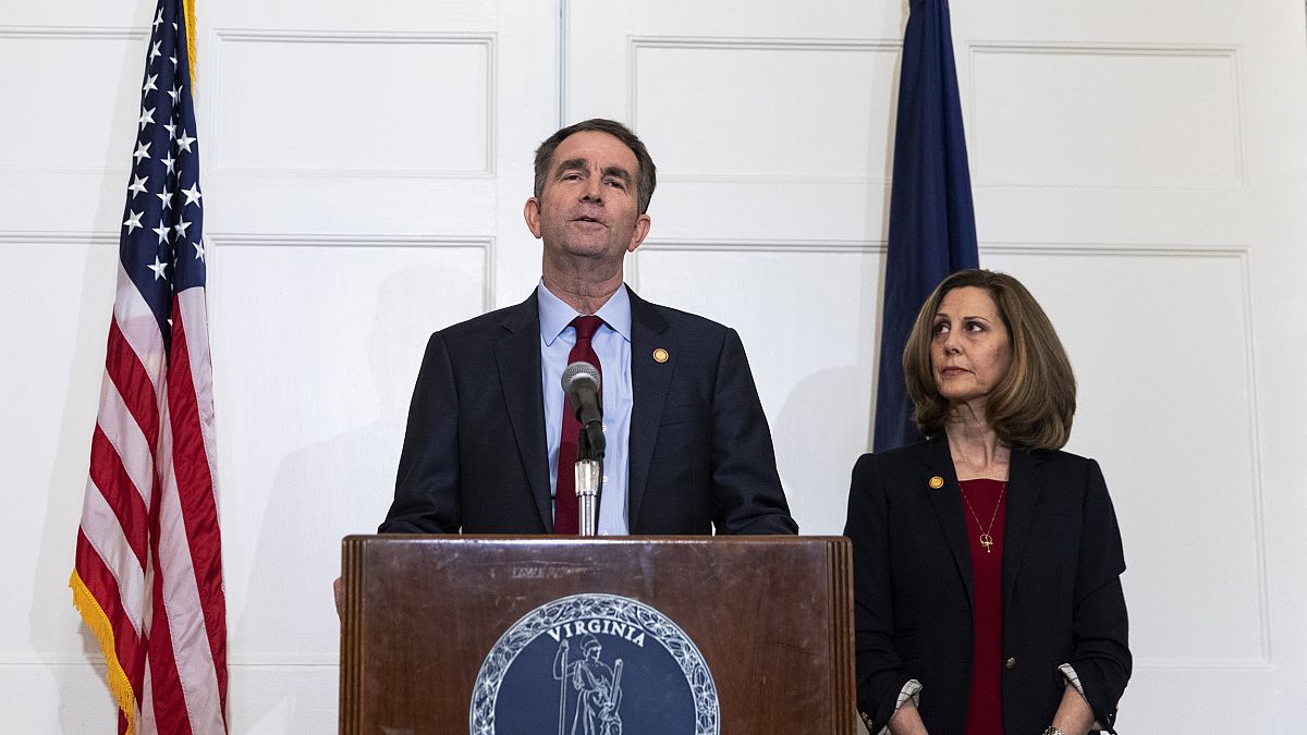 Virginia Governor Ralph Northam speaks with reporters at the Governor's man