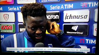 Ghana's Muntari penalized for walking off field after racist chants in Italy