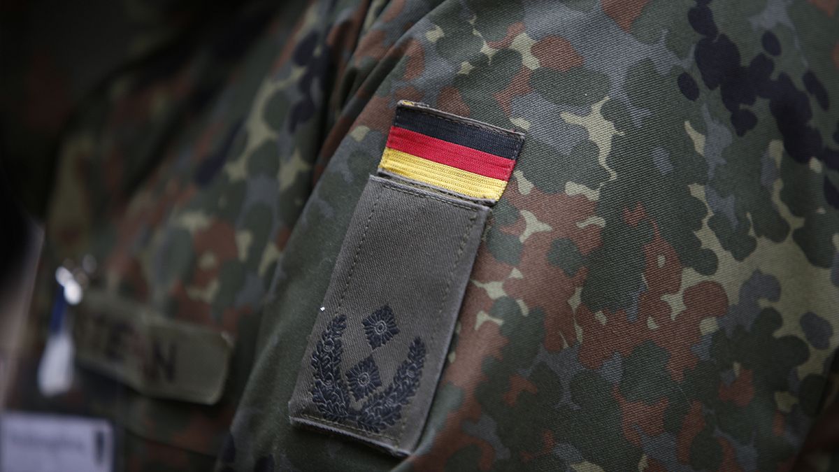Merkel backs German defence minister over far-right army terror scandal