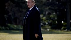 Image: President Donald Trump walks on the South Lawn of the White House on