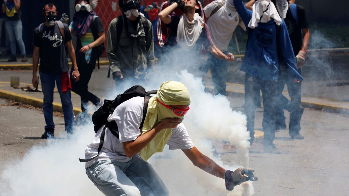 Students clash with police as Venezuela violence rages