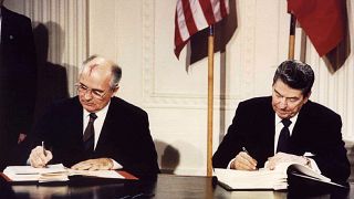 Image: President Ronald Reagan and Soviet leader Mikhail Gorbachev sign the