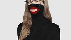 Image: An online fashion outlet showing a Gucci turtleneck black wool balac